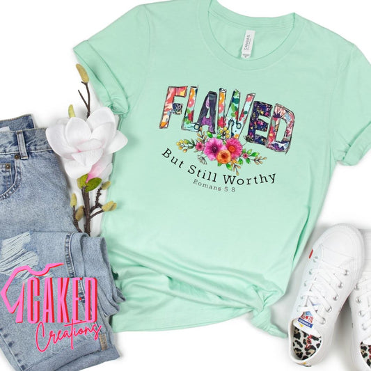 Flawed But Still Worthy Tee – Romans 5:8 Scripture Floral Shirt